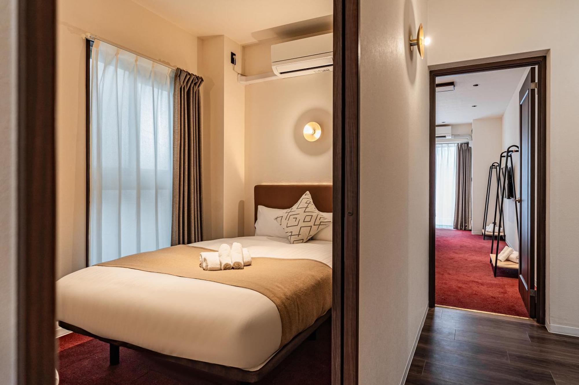 Apartment Hotel 11 Shinsaibashi Amemura أوساكا المظهر الخارجي الصورة