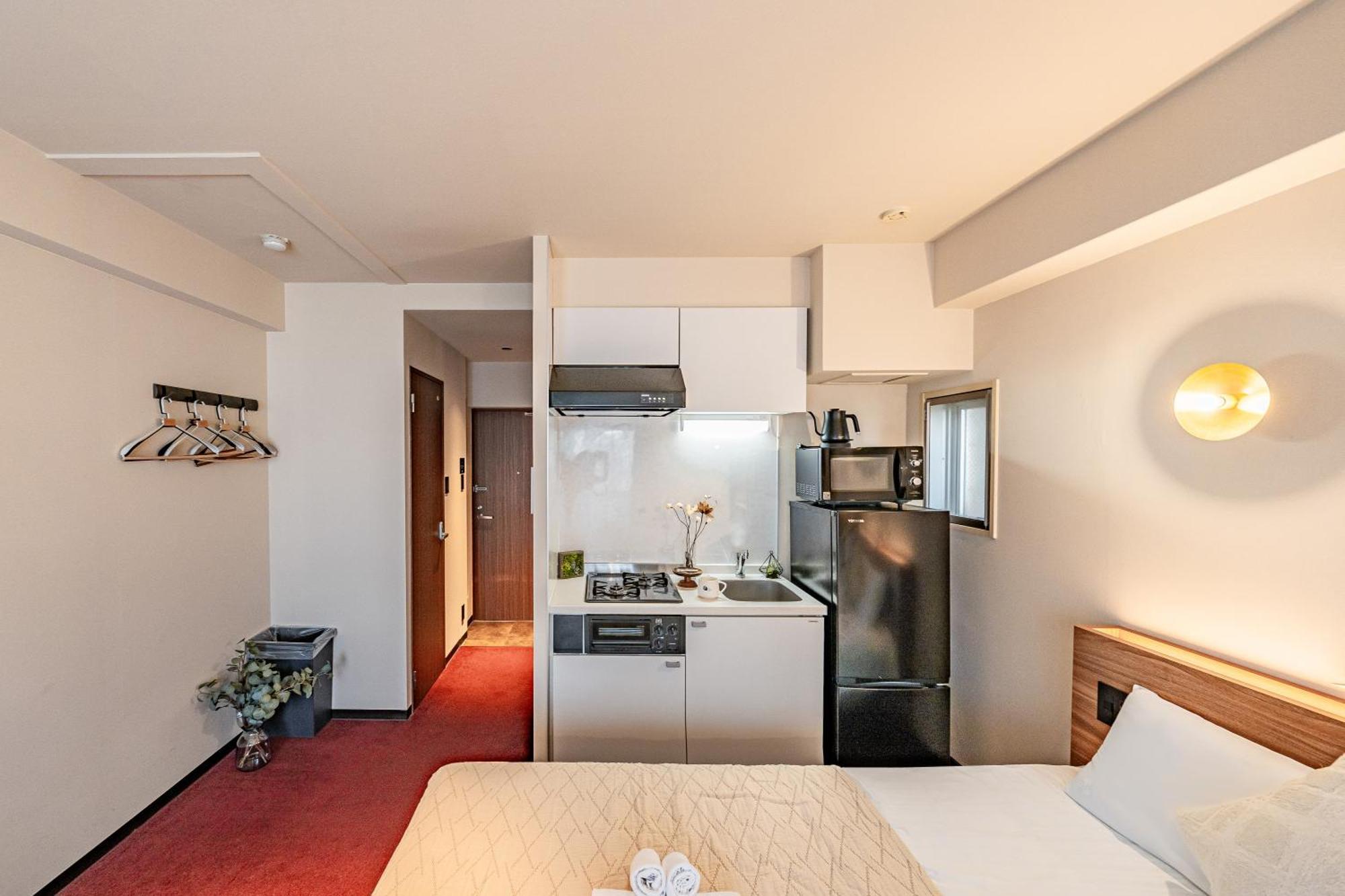 Apartment Hotel 11 Shinsaibashi Amemura أوساكا المظهر الخارجي الصورة
